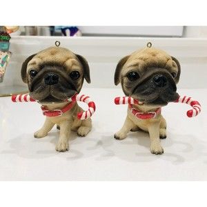 A Pair Of Pug Dog Holding Candy Cane In The Mouth Christmas Ornament